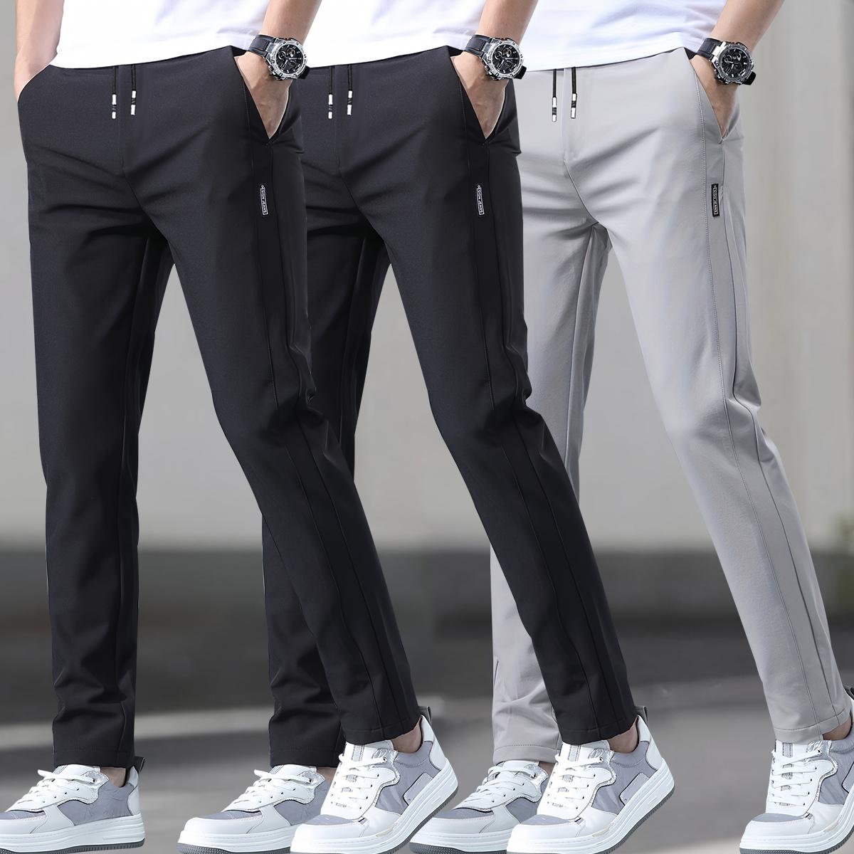 Men's 3-pack slim fit straight leg casual pants, polyester spandex blend, featuring an elastic waistband with drawstring, mid-rise, side pockets, suitable for outdoor activities and everyday wear SpringStatements