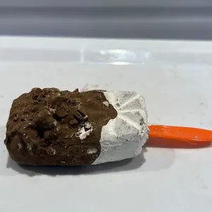 Miscelánea aurora piece of white and brown clay. 3 inches long. Made in Mexico