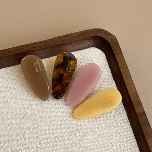 a set of four,Waterdrop-Inspired Hair Clip – Elegant Side Claw for Bangs & Fine Hair