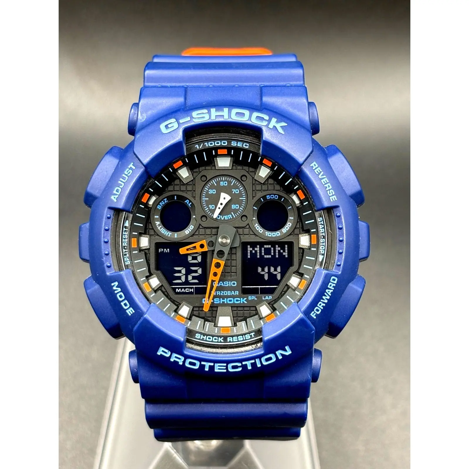 Casio G-Shock GA100L-2A Military Blue Orange Band Men's Analog-Digital Watch