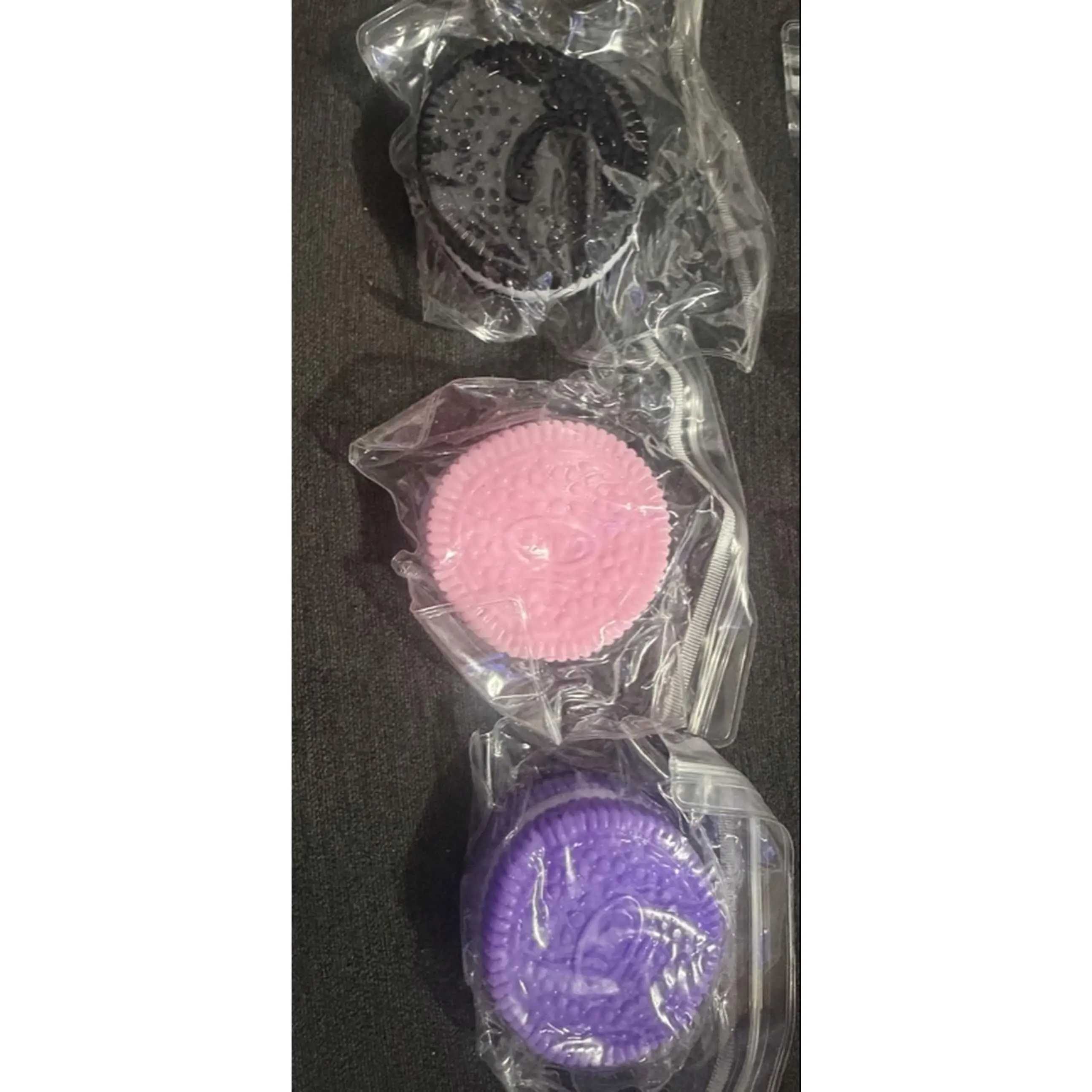 3 Pcs Taba Oreo Squishy - Fun and Interactive Stress Relief Toy for Kids and Adults  The pack comes with black , purple and pink