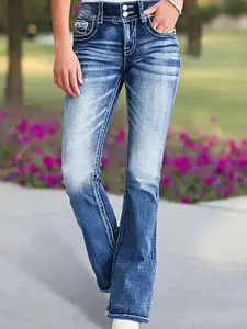 Slim Fit Stretch Flare Jeans with a Mid Rise and Delicate Embroidered Back Pockets that Add a Classy Western Charmto Your Outfit