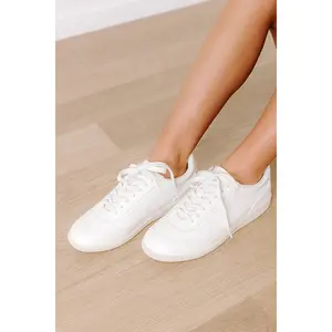 The Remi Faux Leather Sneaker in White