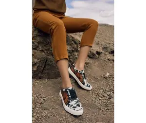 Limited Edition: Cow Print and Leather Tooled Sneakers