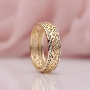 A Women'S Hollow Patterned Ring with Faux Diamonds, a Stylish And Unique Piece of Jewelry for Women