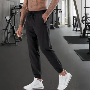 Men’s lightweight, breathable quick-dry sports pants with zippered pockets—fashionable long trousers for summer that go well with anything.