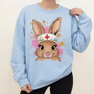 [Made in USA] Easter Bunny Nurse Sweatshirt, Cute Bunny Nurse Graphic Crewneck Pullover, Easter Nurse Bunny Medical Graphic Crewneck, Trendy Cute Nurse Easter Outfit, Bunny Nurse Sweatshirt Pullover, Easter Gift For Nurse Women Healthcare