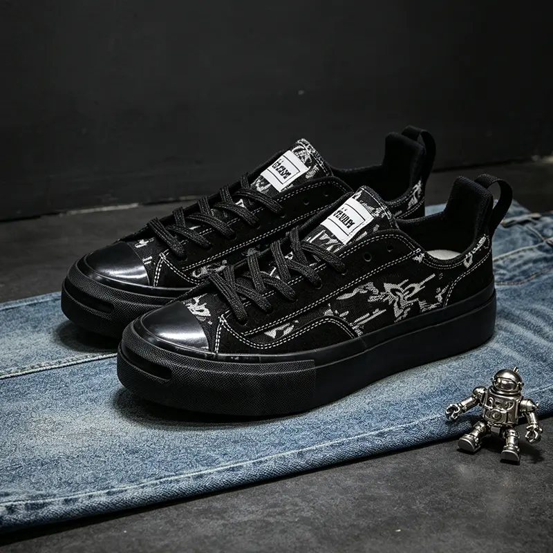 Unisex Matte Black Low-Top Canvas Skate Shoes - All-Black Graffiti Star Print, Thick-Soled, Gothic Street Style, Soft Fabric, Skate Style, Athletic Casual Footwear, Casual Skateboarding Shoes, Daily Wear for Teens & Adults, Thick Rubber