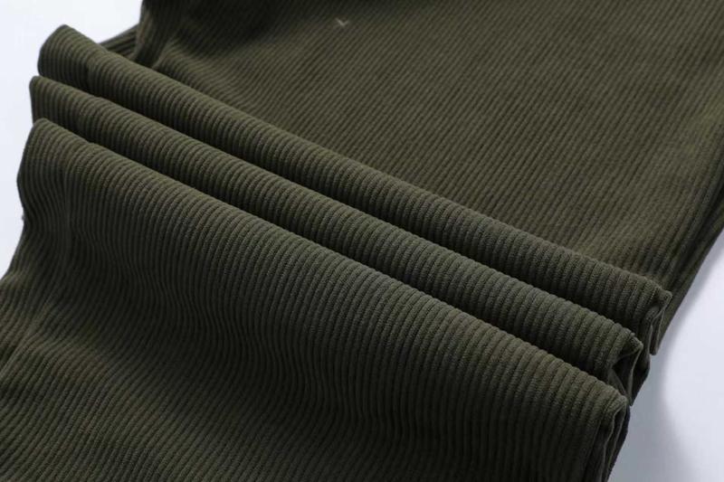 Two men's casual pants featuring a simple and versatile style with drawstring design, adding a casual feel. The pants have delicate small details, making them full of texture. The loose fit provides comfortable and relaxed wear, suitable for everyday outi