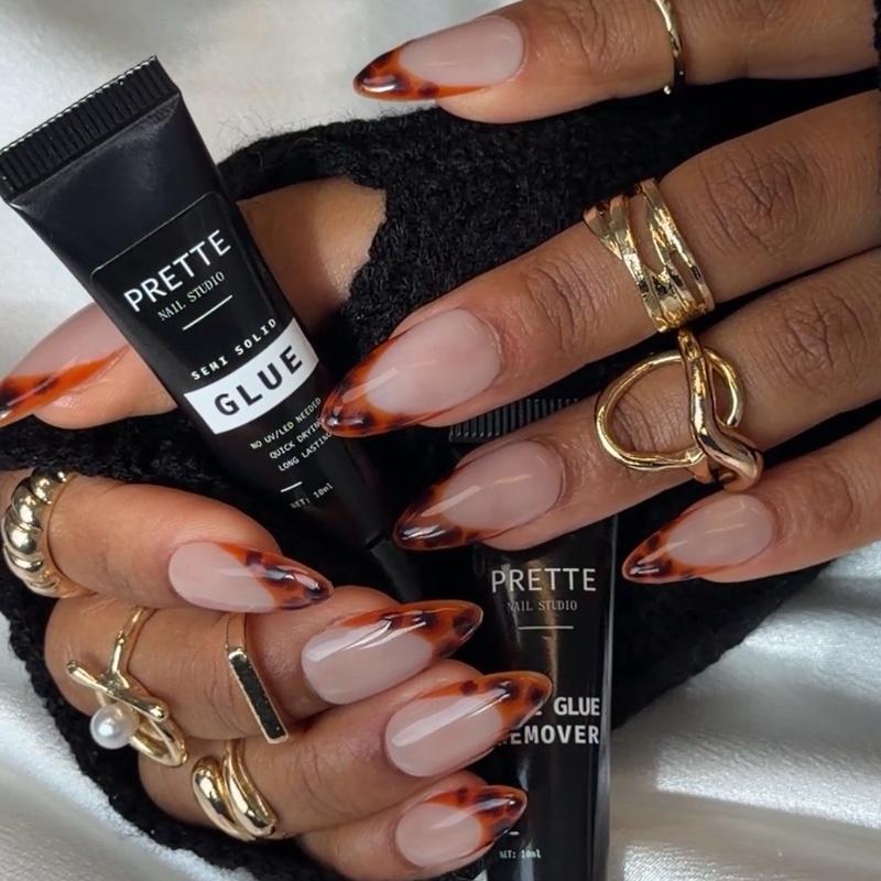 Prettè Nail Studio Amber Muse Press On Nails Medium Almond Nude Tortoise French Tips for Stylish Manicures