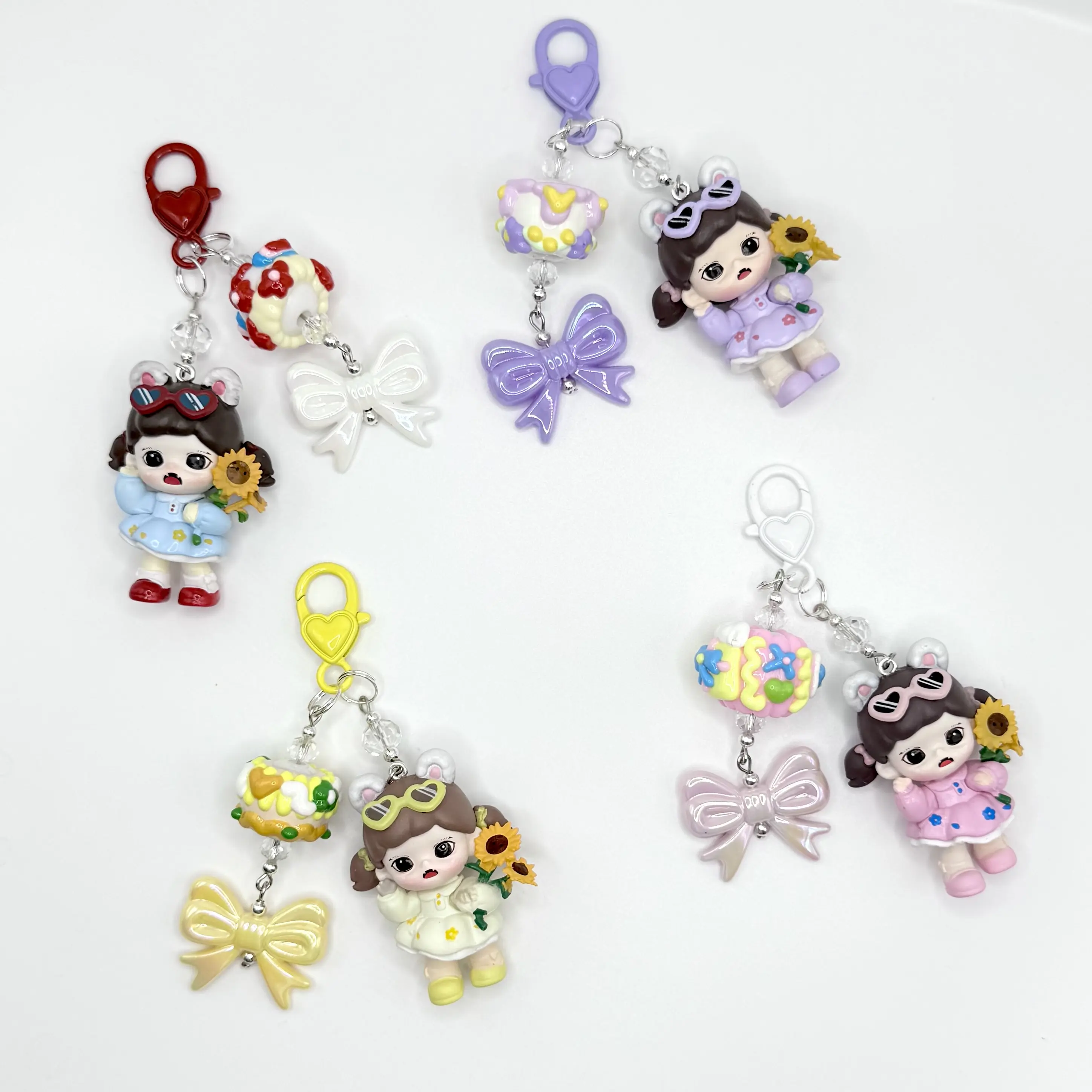 Baby Zora Daisy Girl Mini Figure Keychain Bag Charm Phone Charm Adorable Doll Design with Bow and Sunflower Accents