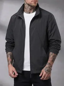 Men’s fashion spring basic casual jacket, windproof and waterproof, solid color, versatile, comfortable for everyday wear, lightweight solid-color softshell jacket with anti-theft zippered pockets