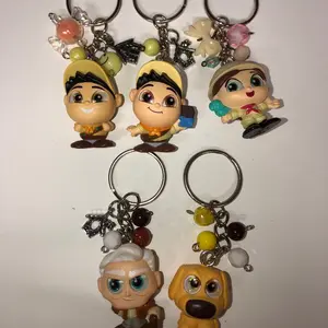 Up characters doorables keychains