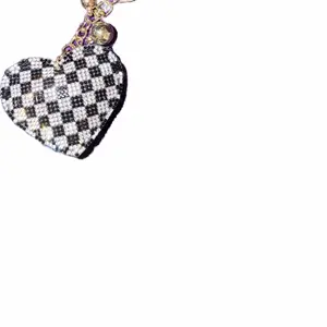 Black checkered heart bag charm