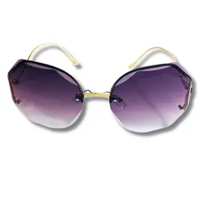 The Joly Rimless Round Sunglasses with Metal Frame and Bevelled Lenses x Available in Five Colors