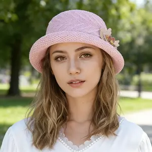 Women's elegant summer straw hat with floral design, foldable sun hat, sun protection beach hat.