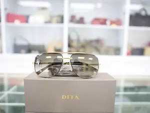 Pre-owned DITA MIDNIGHT SPECIAL YELLOW GOLD AND BLACK TITANIUM FRAME