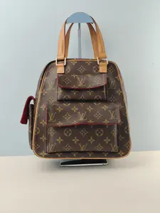 Pre-owned Monogram coated canvas Shoulder Bags Louis Vuitton Monogram Excentri Cite Hand Bag