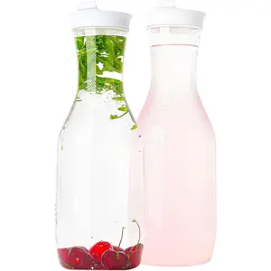 Clear Plastic Water Pitchers Carafes with Flip top White Lids 50 OZ Heavy Duty Beverage Pitcher Jug for Juice or iced Coffee Great for Mimosa bar Restuarants ot Schools Pack of 2