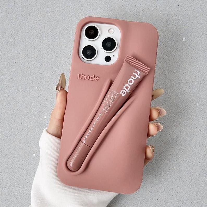 Rhode Lip Tint Silicone Phone Case with Lip Gloss Holder for iPhone 11-17 Shockproof Design Smooth Application Fashionable Protective Nutrients Convenient Daily Use