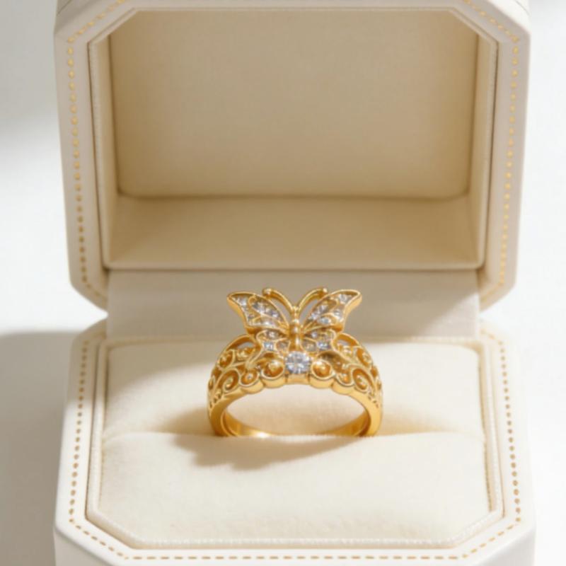 An elegant, classic 14k gold-plated ring with a butterfly design, adorned with sparkling Zirconia stones, suitable for weddings, engagements, everyday wear, gifts, and parties. An elegant, classic 14k gold-plated ring with a butterfly design, adorned with sparkling Zirconia stones, suitable for weddings, engagements, everyday wear, gifts, and parties.