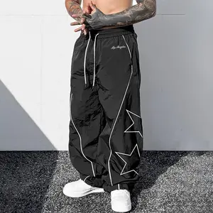 Men's Printed Loose Fit Wide Leg Pants - White star and letter print, contrast stitching, casual street style, soft fabric, everyday outfit with perfect fit