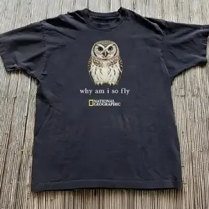 Gildan Men's and Women's T-shirt, National Geographic black owl graphic tee, Animal tee, Y2k Unisex Graphic Tees Gothic Grunge Emo Scene Amity Affliction Style Clothes Menswear Womenswear Streetwear