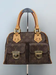 Pre-owned PVC coated canvas Clutches & Wristlets Louis Vuitton Monogram Canvas Manhattan PM Handbag