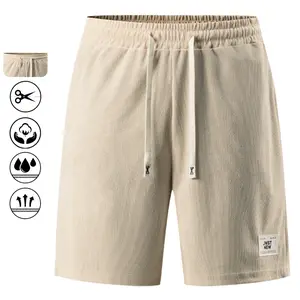 Modern minimalist men’s shorts featuring a contrast drawstring accent and vintage label patch for versatile everyday wear