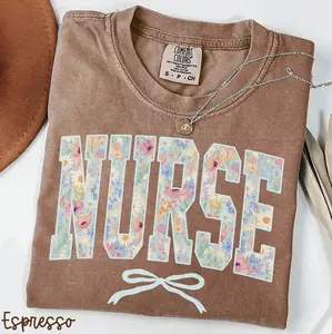 Comfort Colors Floral Nurse Shirt Vintage Wildflower Nurse Graphic Tee Coquette Bow Healthcare Worker Gift Nursing Student Aesthetic T-Shirt