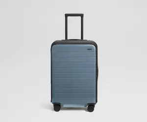 Clear Luggage Cover in The Bigger Carry-On