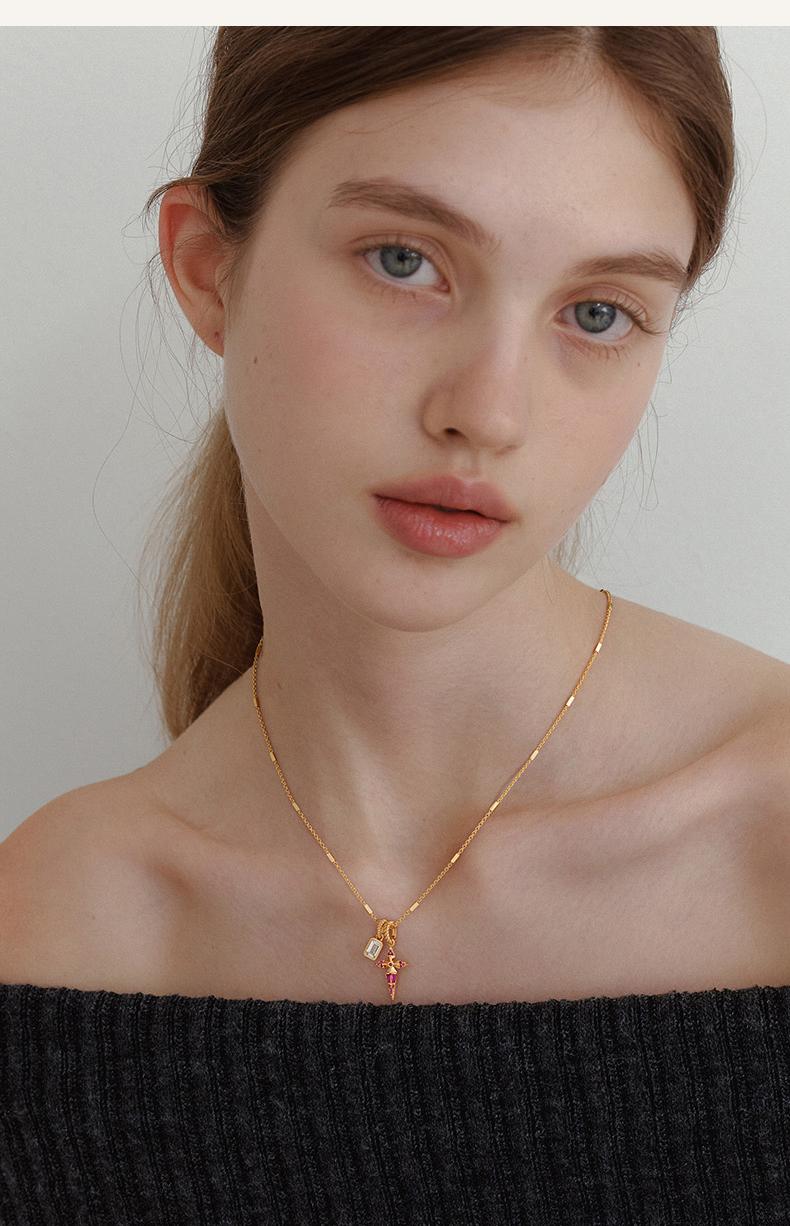 FetteroGold Plated Cross Necklace with Pink Sapphire and Crystal Charms - Twisted Rope Chain Pendant Necklace for Women FetteroGold Plated Cross Necklace with Pink Sapphire and Crystal Charms - Twisted Rope Chain Pendant Necklace for Women