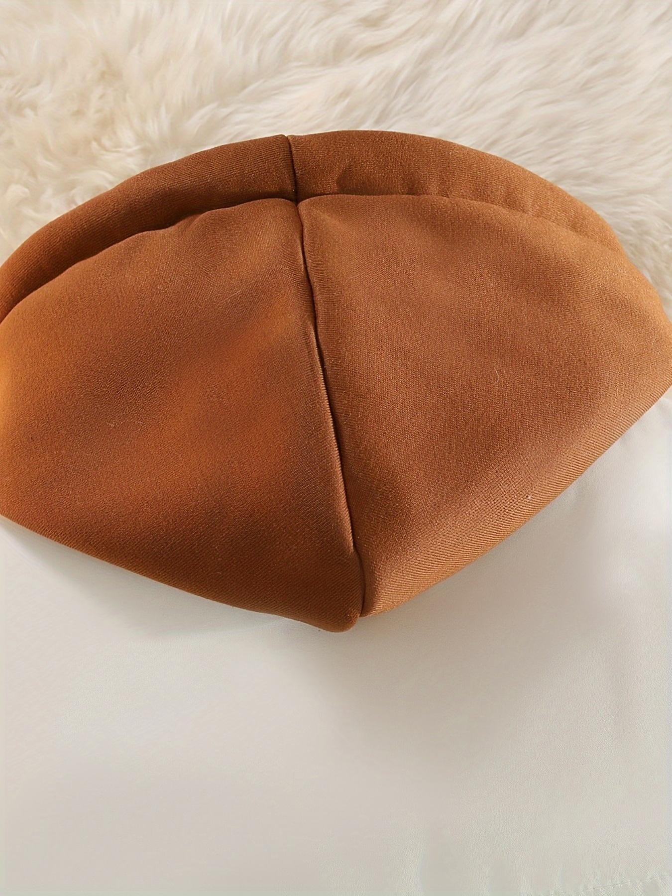 Packable hooded vest folded down, easy-care winter outerwear