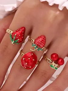 Women’s 4-piece red strawberry ring set — delicate, fashionable, cute, playful, lively, elegant, versatile; ideal for everyday wear, holidays, and parties; a perfect gift.