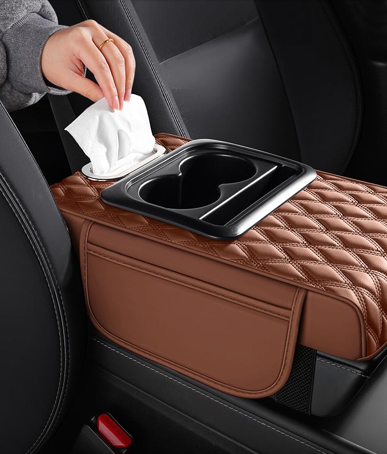 Leather car armrest cushion! This multi-functional pad holds cups, tissues, and storage—no more dangling arms on long drives! Solve all your road trip pain points for the price of a bubble tea!