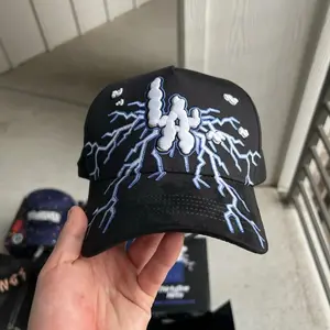 31 HATS "LA Electric Clouds" Model Cap with Unique Lightning Bolt Design and Adjustable Fit for Stylish Wear