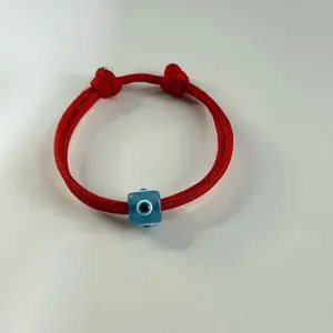 Adjustable red cord with big  evil eye