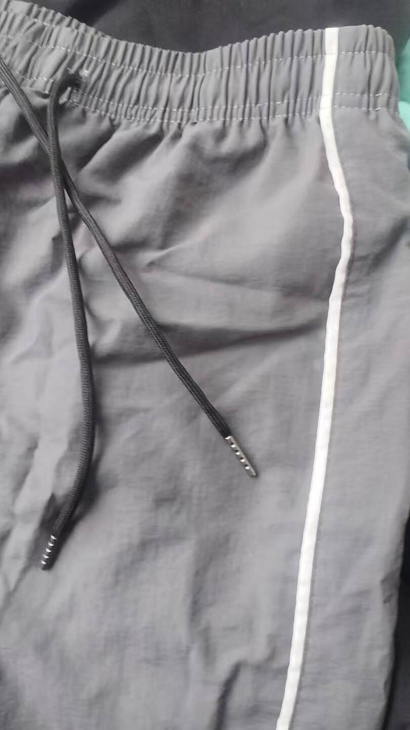 Men's casual athletic pants relaxed fit with drawstring cuffs lightweight fabric perfect for everyday wear