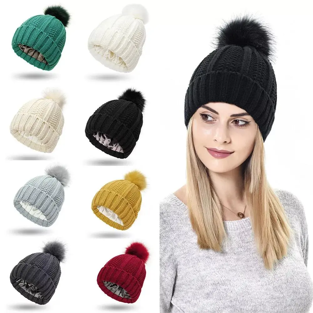 Womens Winter Beanie Hat Satin Lined Faux Fur Pom Pom Knitted Beanies Hat for Women Winter Warm Soft Knit Skull Cap Black