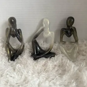 The Thinkers      A mid-range decorative interpretation of Rodin’s thinker pose — good for casual home decor without the premium price.