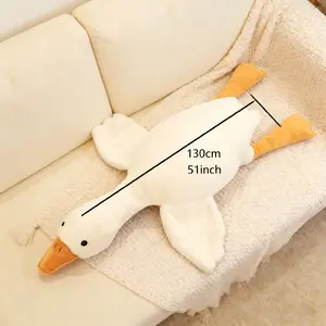 birthday gift ideaCute Big White Goose Plush Pillow Toy! Large and irresistibly huggable, it's a favorite for both kids and adults. Suitable for all beds, offering coziness whether you cuddle or clamp it. A practical and sweet sleep companion.