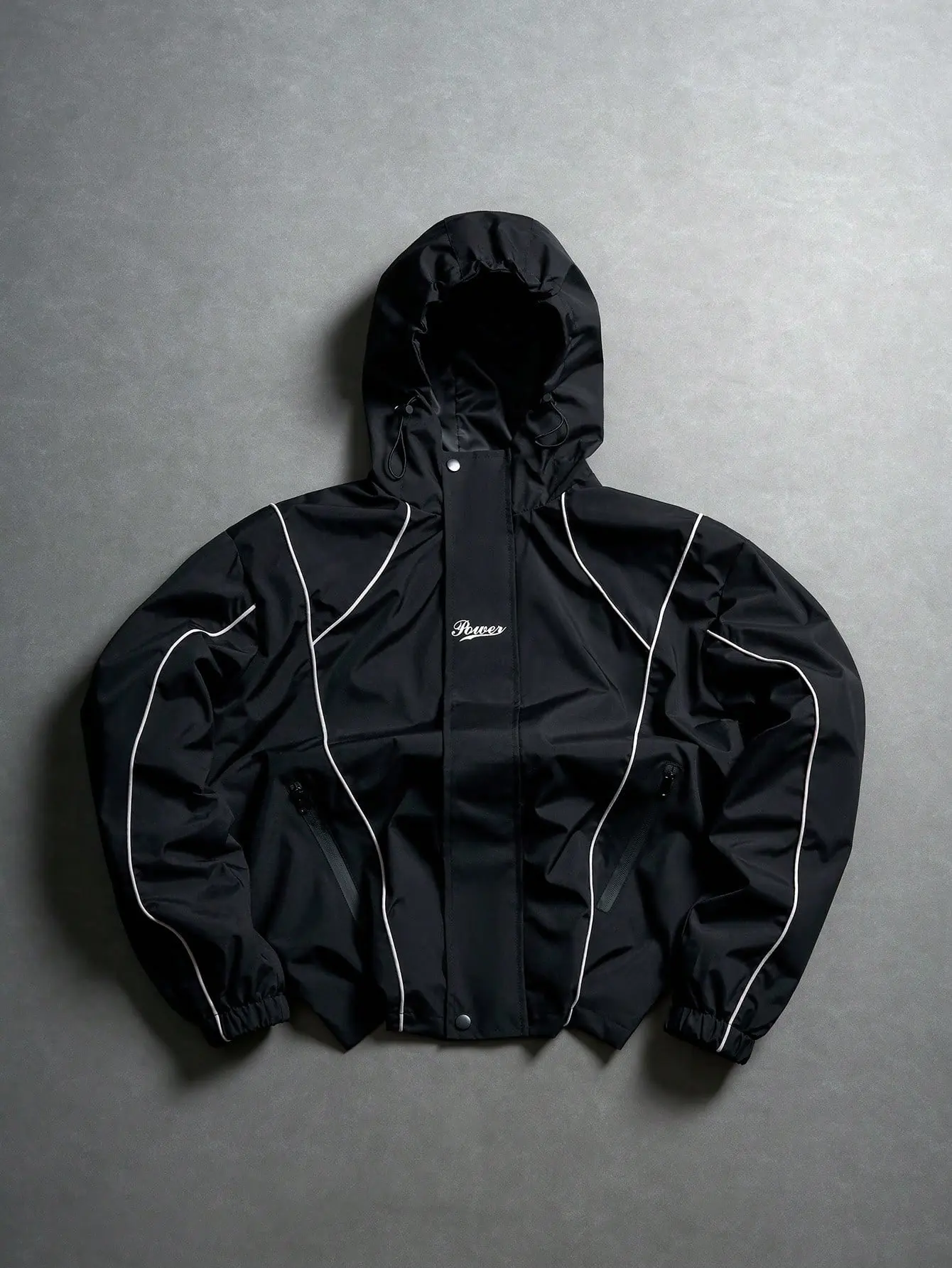 Unisex black and white striped “Power” handwritten script cropped hooded windbreaker – waterproof woven fabric, adjustable drawstring hood, double closure with snap and zipper, dual waterproof zippered pockets, elastic cuffs, American retro high street ja