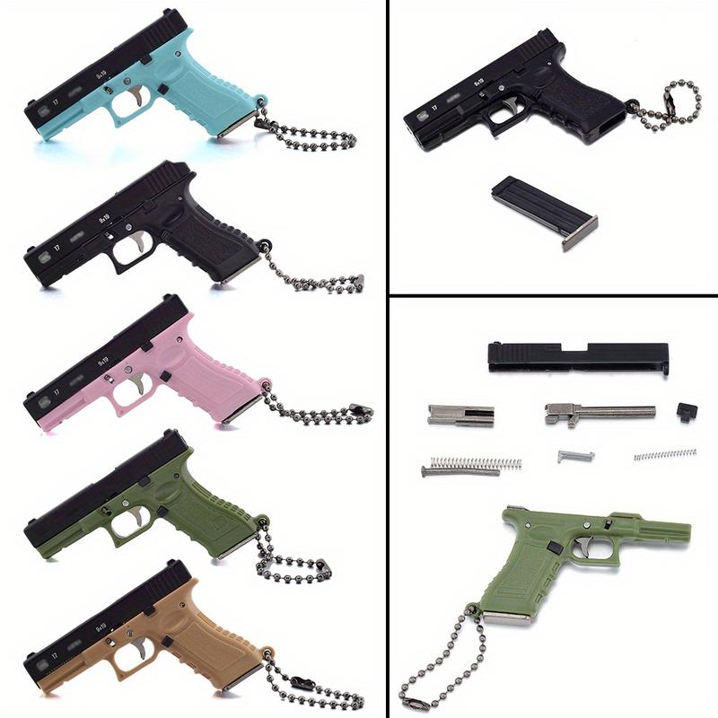 1-Piece Classic 1:3 Scale Glock G17 Miniature Keychain – Tactical Military-Themed Mini Keychain Pendant. Exquisitely crafted with high wear resistance, superior hardness, and durable metal construction. Gaming Collectors