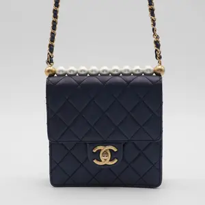 Pre-owned CHANEL leather Crossbody Bags Quilted Lambskin Chic Pearls Navy Mini Flap Bag