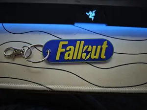 3D Printed Fallout inspired Keychain in Blue and Yellow with Rotatable Lobster Claw Clasp