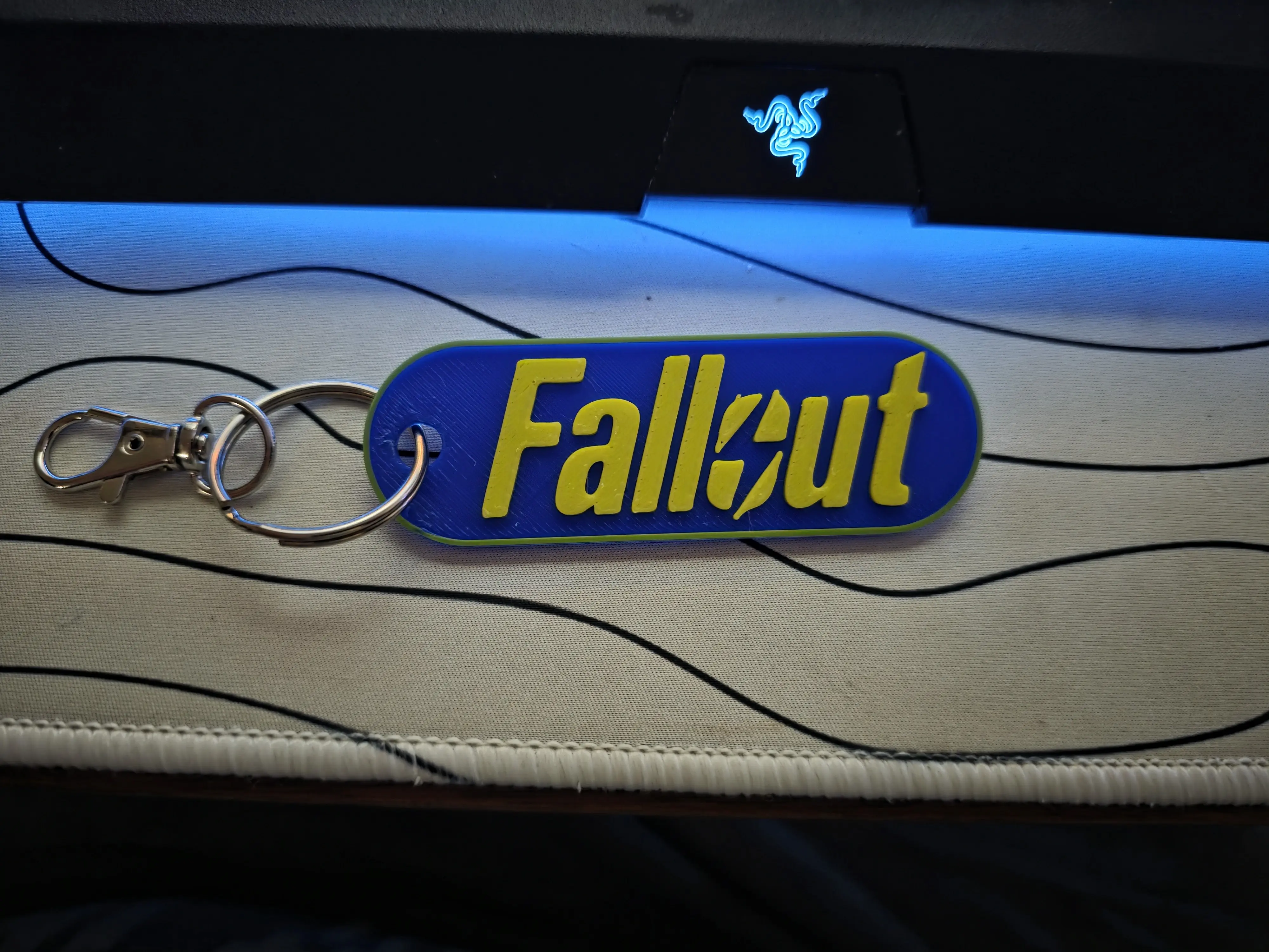 3D Printed Fallout inspired Keychain in Blue and Yellow with Rotatable Lobster Claw Clasp