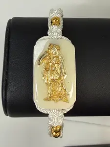 Pulsera De La Santa Muerte Tejida a Mano con (dorada) /Hand-woven Santa Muerte bracelet with (gold)