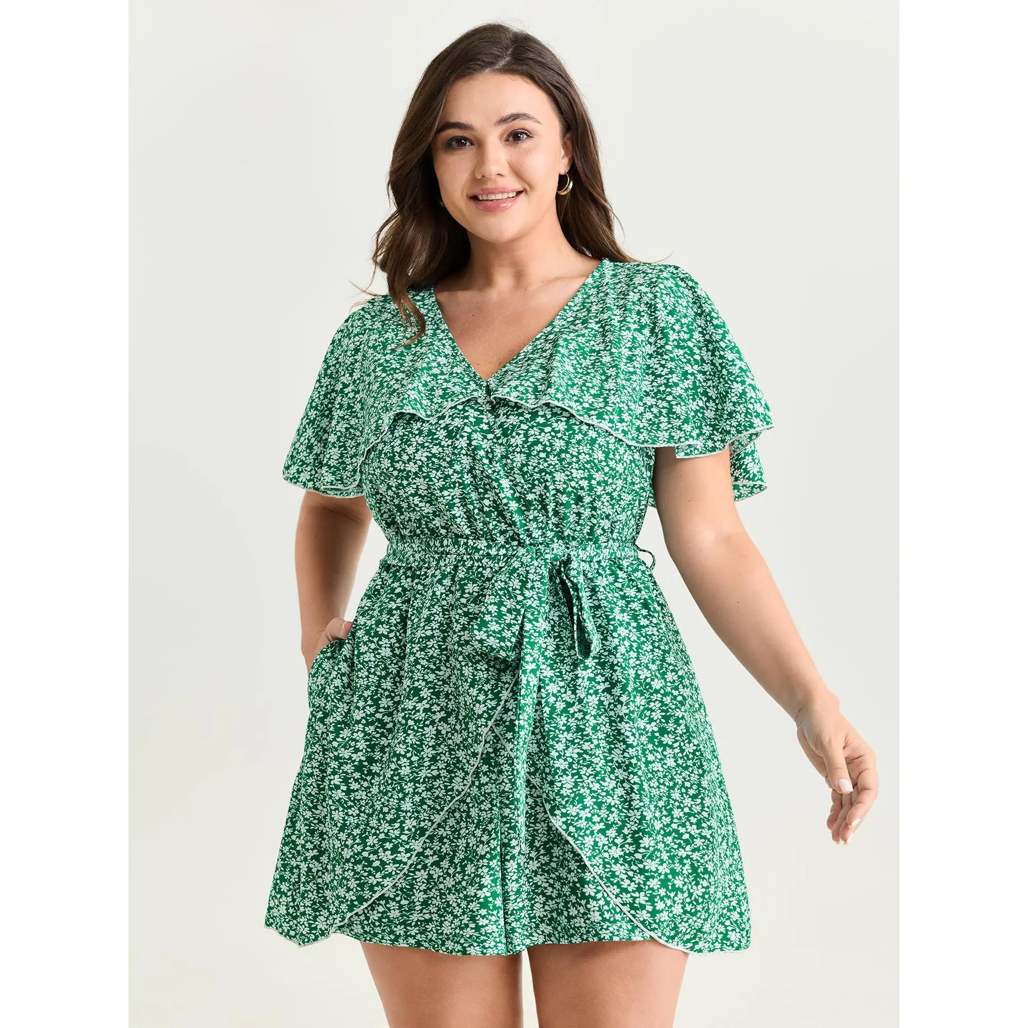 BloomChic Women's Plus Size Ditsy Floral Overalls, Shortsleeve Spandex Blend Wrap Romper with Ruffle Hem, Garment, Low Iron, Plus Size Overalls, Side Pocket, Fitted Romper, Ruffled Hem, Romper Overalls