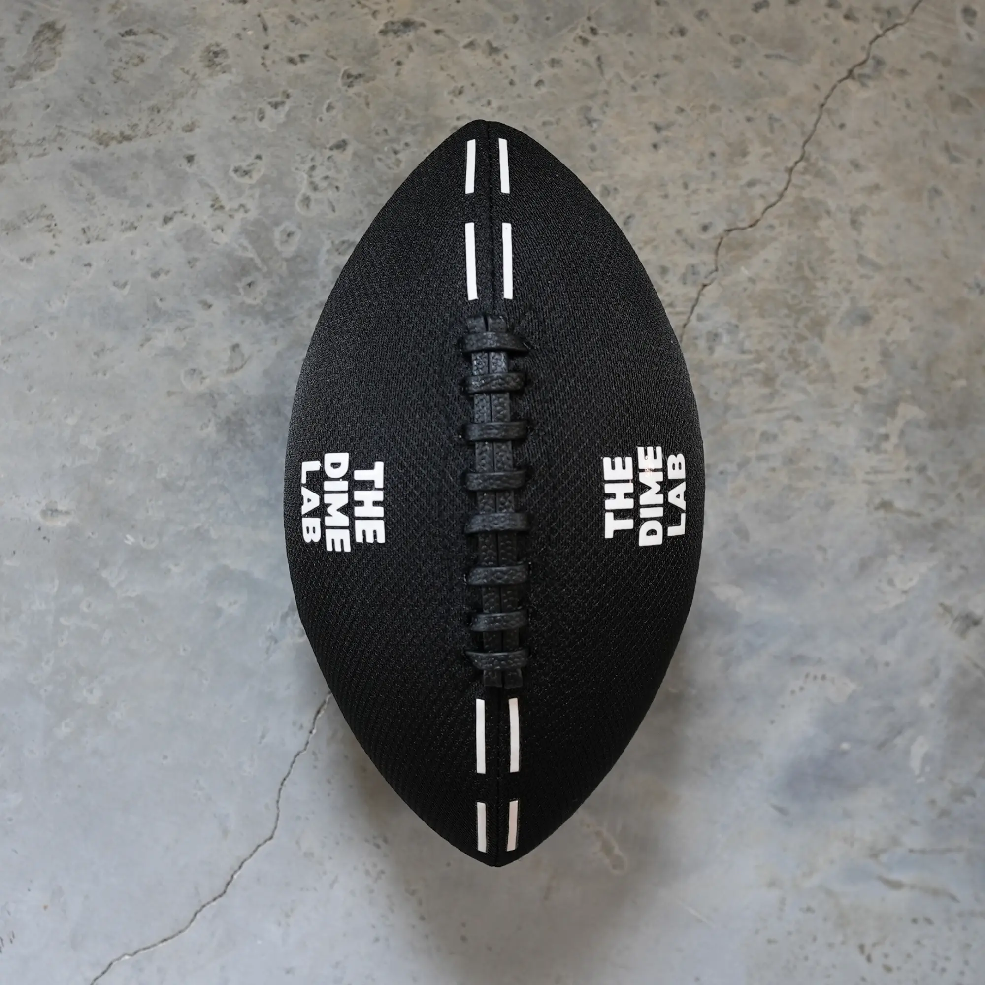 The Dime Lab Mini Waterproof American Football - Silicone Grip, Textured Laces, Accurate Throws, Pool Use, Youth Gear, Weighted Ball (2 Sizes, Black)