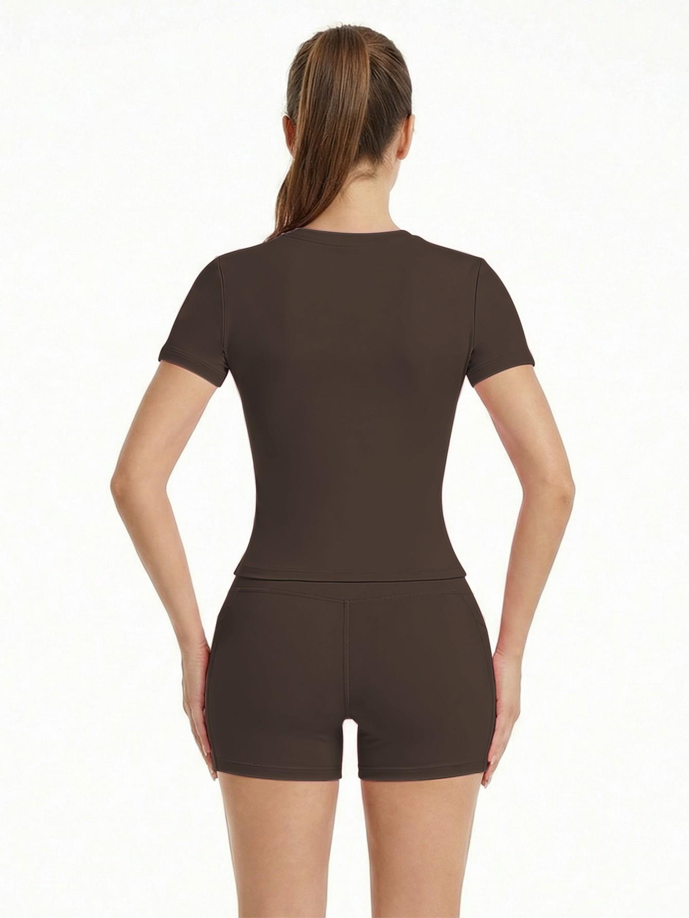 New Women's Two-Piece Set: Solid Color High-End T-shirt and High-Waisted Fitted Shorts Sports Set. This breathable and quick-drying casual sports set is ideal for yoga, gym workouts, summer wear, and fitness running activities. New Women's Two-Piece Set: Solid Color High-End T-shirt and High-Waisted Fitted Shorts Sports Set. This breathable and quick-drying casual sports set is ideal for yoga, gym workouts, summer wear, and fitness running activities.